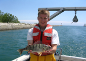 Young Fisherman with Yellow Perch